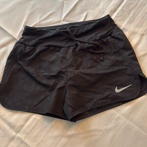 Nike black with subtle cheetah print running shorts